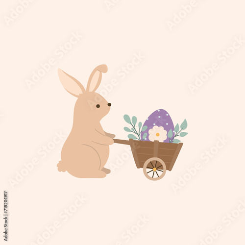 Easter bunny with a wheelbarrow