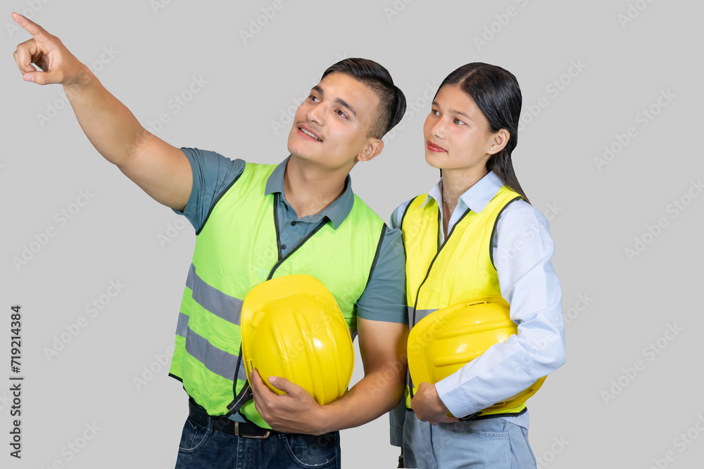 Asian Couple Engineer and Architect giving gestures and expressions on construction field Asian Couple Engineer and Architect giving gestures and expressions on construction field