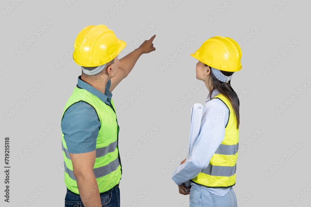 Asian Couple Engineer and Architect giving gestures and expressions on construction field Asian Couple Engineer and Architect giving gestures and expressions on construction field