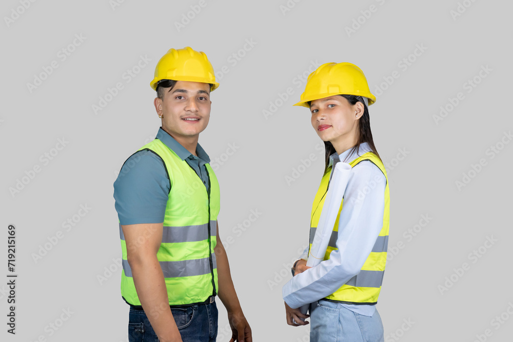 Asian Couple Engineer and Architect giving gestures and expressions on construction field Asian Couple Engineer and Architect giving gestures and expressions on construction field