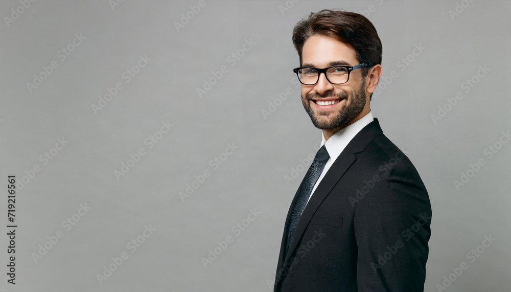 Full body side view fun adult successful employee business man corporate lawyer wear classic formal black suit shirt tie work in office look camera isolated on plain grey background studio Full body side view fun adult successful employee business man corporate lawyer wear classic formal black suit shirt tie work in office look camera isolated on plain grey background studio