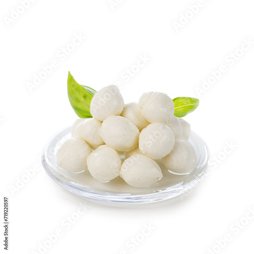mini mozzarella cheese balls with basil isolated on white background