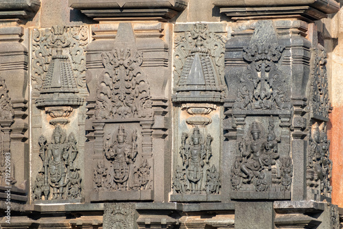 Ornate carvings of a Hindu deities at the ancient Hoysala era Chennakeshava temple in Belur, Karnataka. photo