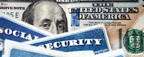 Social Security Cards with US One Hundred Dollar Bill $100 Benjamin Looking