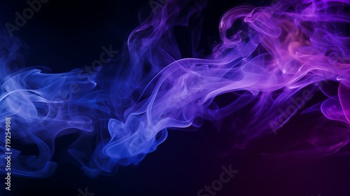 Smoke that is blue and purple and on a black background.