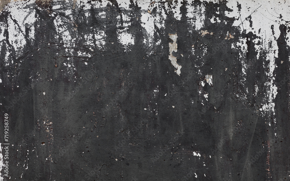 Obraz premium Concrete wall texture with black and white cracked paint. Old concrete wall background. Concrete wall grunge surface with cracked paint. Close up.