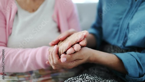 Old Woman And Her Daughter Hold Hands, Comforting Her