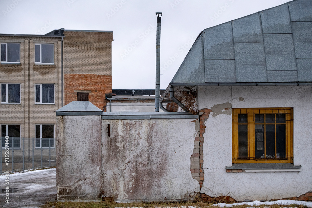 old aged white building with windows old aged white building with windows