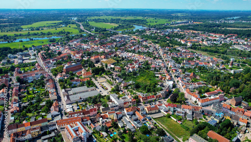 Aerial view around the town Roßlau in Germany on a cloudy day in summer