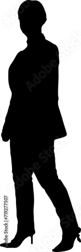 The silhouette of a working woman stands with her legs outstretched to the side.