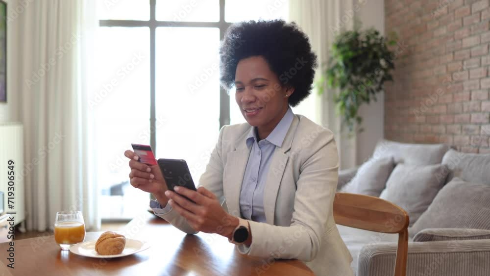 Businesswoman enjoying online shopping