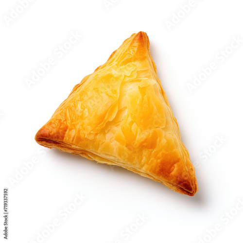 Triangle puff pastry on white background photo