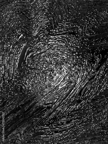 Wrinkled plastic wrap texture on a black background