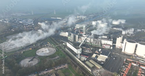 Sugar factory, Sugar Refinery and Industrial facility, Food production industry. Birds eye aerial drone view. Large smoking factory. photo