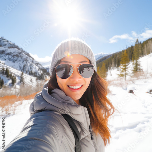 Young woman taking selfie on ice mountain © Bilal
