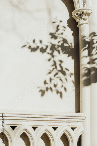 Traditional white wall with decorative balusters