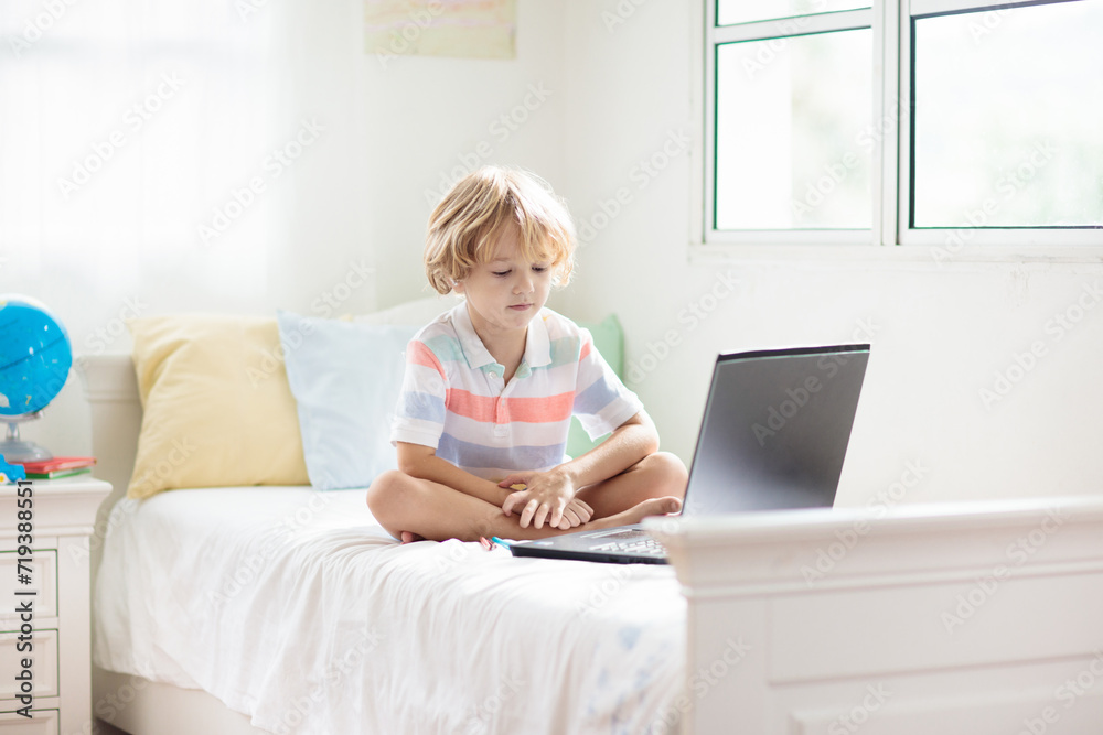 Online remote learning. School kids with computer. Online remote learning. School kids with computer.