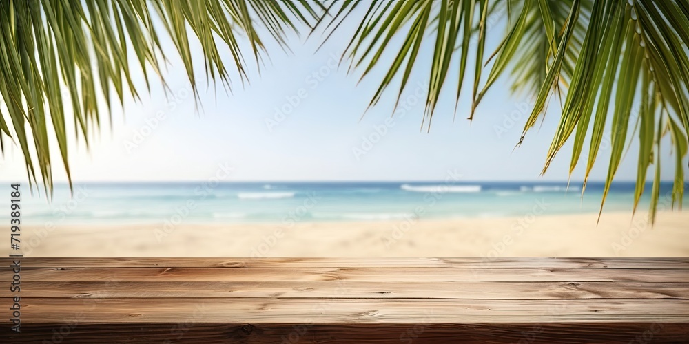 Tropical beach photo with green palm leaf and wooden table for product advertisement. Tropical beach photo with green palm leaf and wooden table for product advertisement.