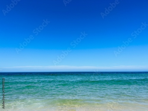 Pure blue sea horizon  blue seascape background  clear sky