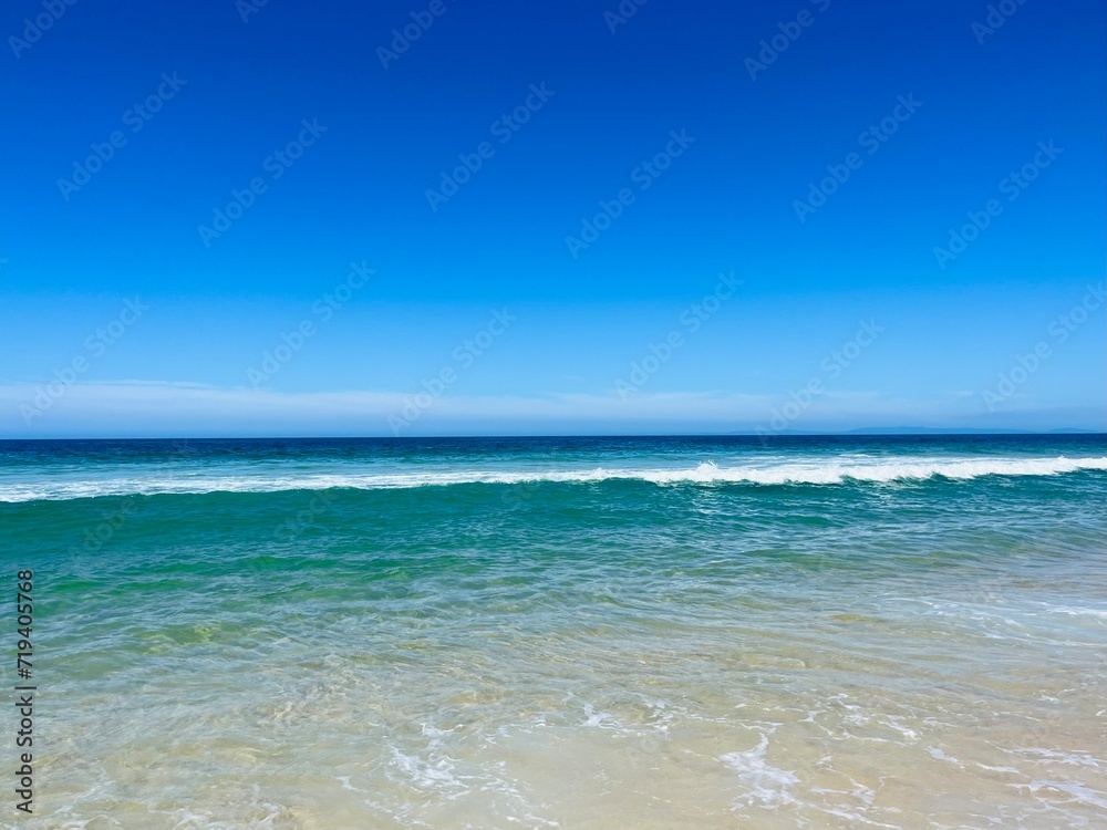 Pure blue sea horizon, blue seascape background, clear sky