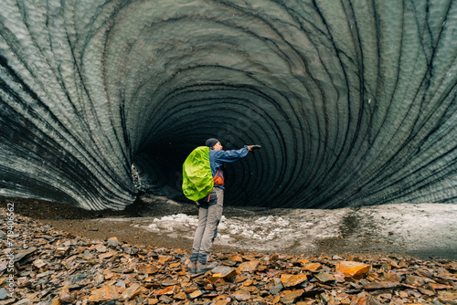 Rounded tunnel ice cave view from the inside. Cueva de Jimbo, Ushuaia, Tierra del Fuego photo