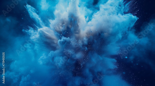 blue dust explosion on a blue background in © Torrent