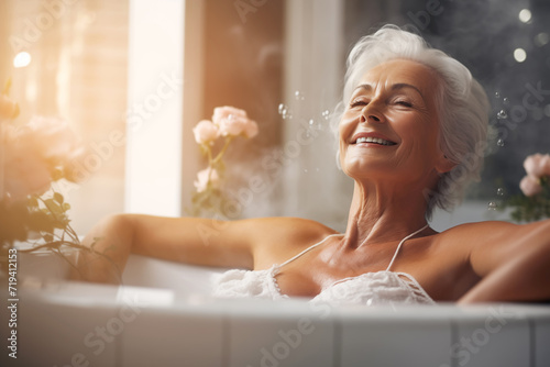 Relaxed Senior Woman in Steamy Bathtub photo