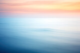 Abstract Sea Surface with Blurred Motion, Ocean Water Background in Pastel Sunset Colors