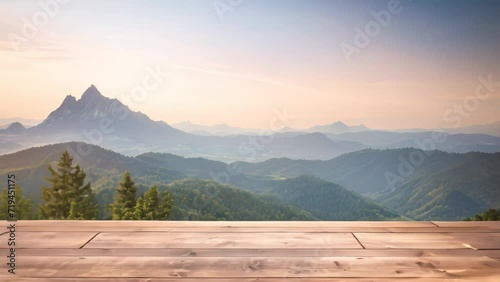 wooden table with mountain sunrise background photo