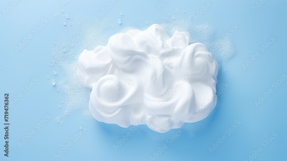 Spread soap foam over a blue background. Spread soap foam over a blue background.