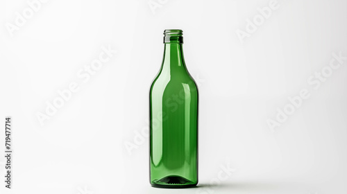 Transparent glass bottle on white background.