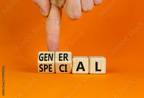 General or special symbol. Businessman turns beautiful wooden cubes and changes the word Special to General. Beautiful orange table orange background. Business general or special concept. Copy space.