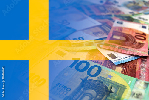 Euro banknotes colored in the colors of the flag of Sweden. Gradient overlay of the Swedish flag on the euro notes.