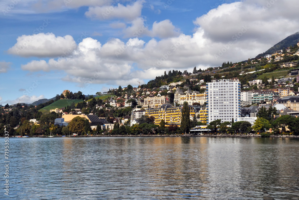 Montreux, Vaud, Switzerland, Europe - city center seen from Lake Geneva, Eurotel Montreux hotel -  white tall building, yellow Montreux Palace Hotel, left - Miles Davis Hall and Auditorium Stravinsky