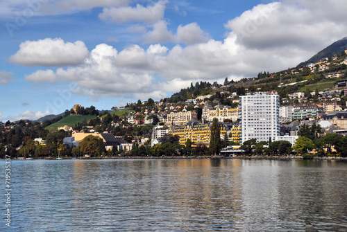 Montreux, Vaud, Switzerland, Europe - city center seen from Lake Geneva, Eurotel Montreux hotel -  white tall building, yellow Montreux Palace Hotel, left - Miles Davis Hall and Auditorium Stravinsky