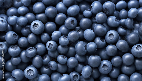 Blueberries background. Blueberries are scattered on the table. Lots of berries. AI generated © Alex Puhovoy