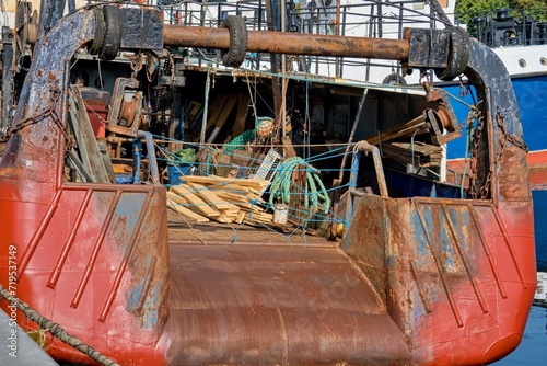 Rusty trawler stern. Trawler under repair.