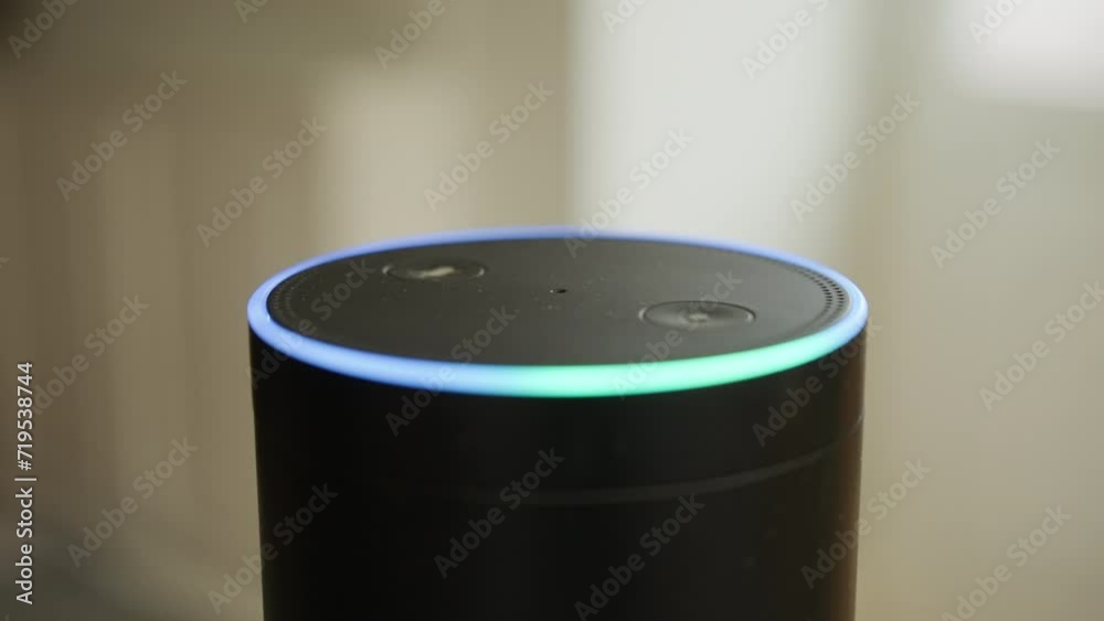 Close up of smart speaker activating after being spoken to