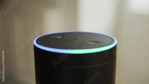 Close up of smart speaker activating after being spoken to
