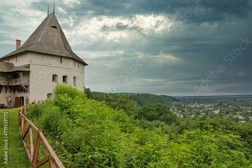 Medieval Halych Castle under stormy sky in Ukraine. photo