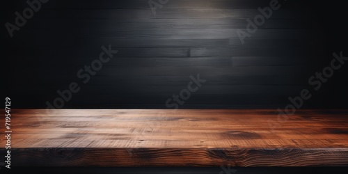 Textured wooden table top against a dark interior background for showcasing products or designing visuals. photo