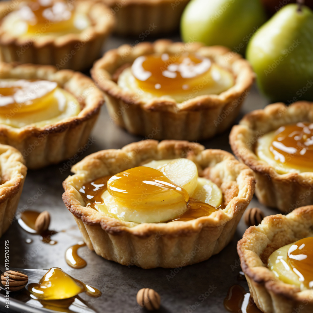 Golden-Crusted Brie & Pear Tartlets Drizzled with Honey Golden-Crusted Brie & Pear Tartlets Drizzled with Honey