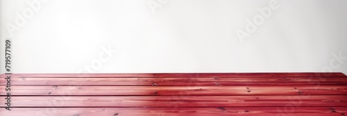 Empty wooden crimson table over white wall background