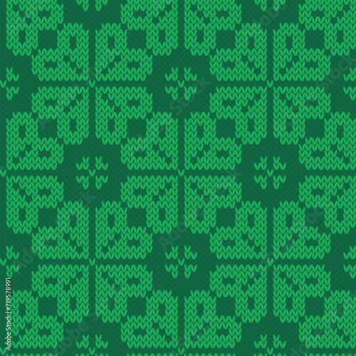 Green clover fair isle jacquard knitted seamless pattern. Winter background. Vector illustration.