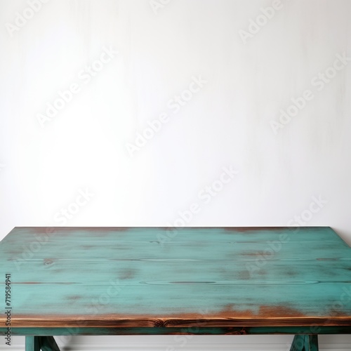 Empty wooden teal table over white wall background