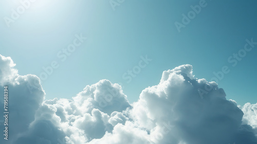 Fluffy Cumulus Clouds with Sunlight in Blue Sky