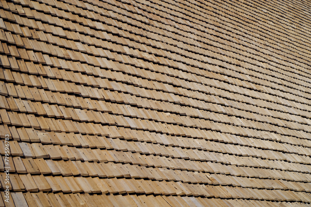 Abstract background image of weathered wooden tiles on the roof Abstract background image of weathered wooden tiles on the roof
