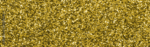 Golden and shimmery bright and glitter material background