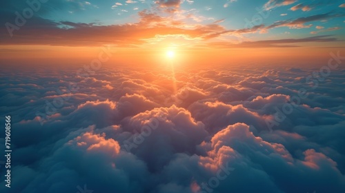  the sun is setting over the clouds as seen from the window of a plane on the way to the nearest part of the island of the island of the island.
