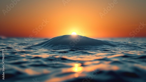  a sunset over a body of water with a small island in the middle of the water in the middle of the ocean with a bright orange sky in the background.